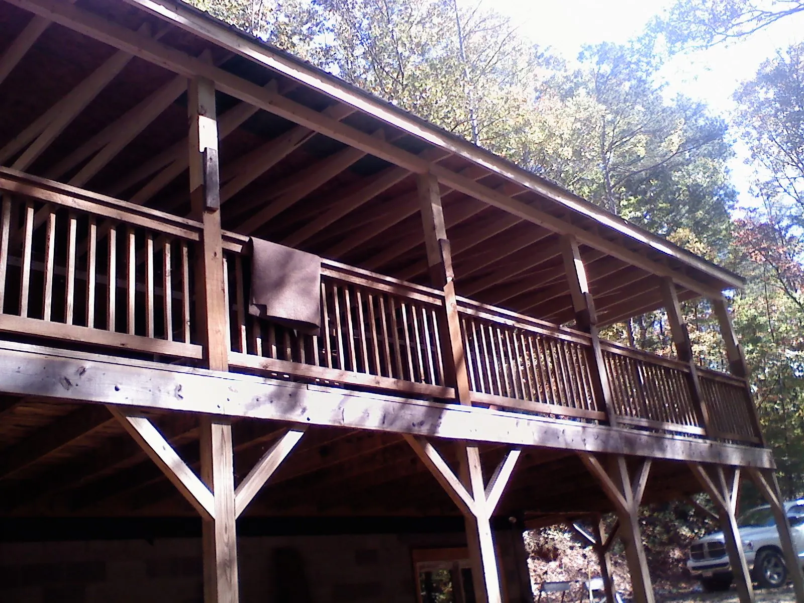 Timber framing under a new elevated porch and deck — Roof Leak Repair in Bossier City by Roofing Brothers